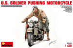 U.S. Soldier Pushing Motorcycle