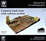 Country road cross with railway section